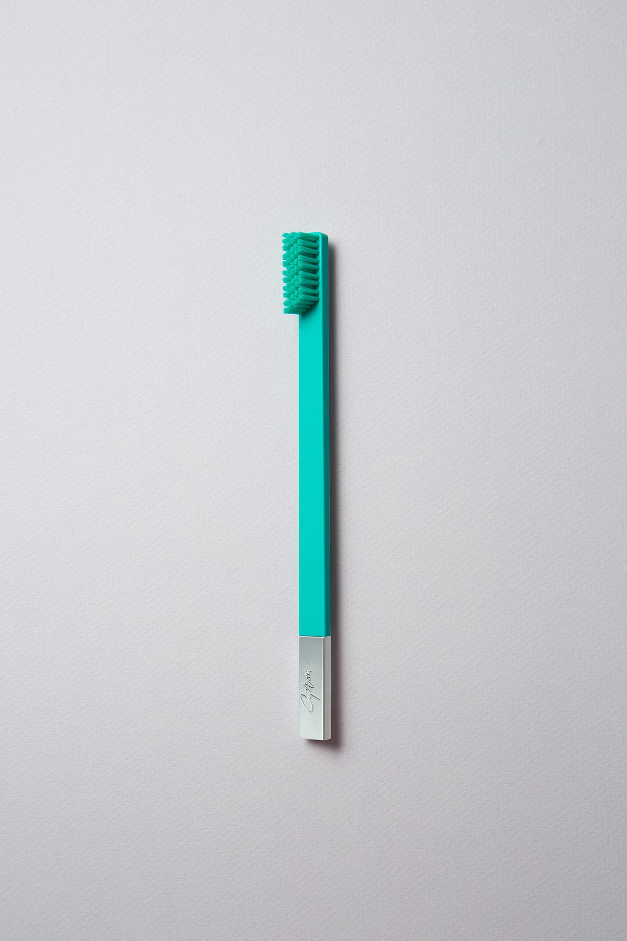 slim_turquoise_silver_toothbrush_2a