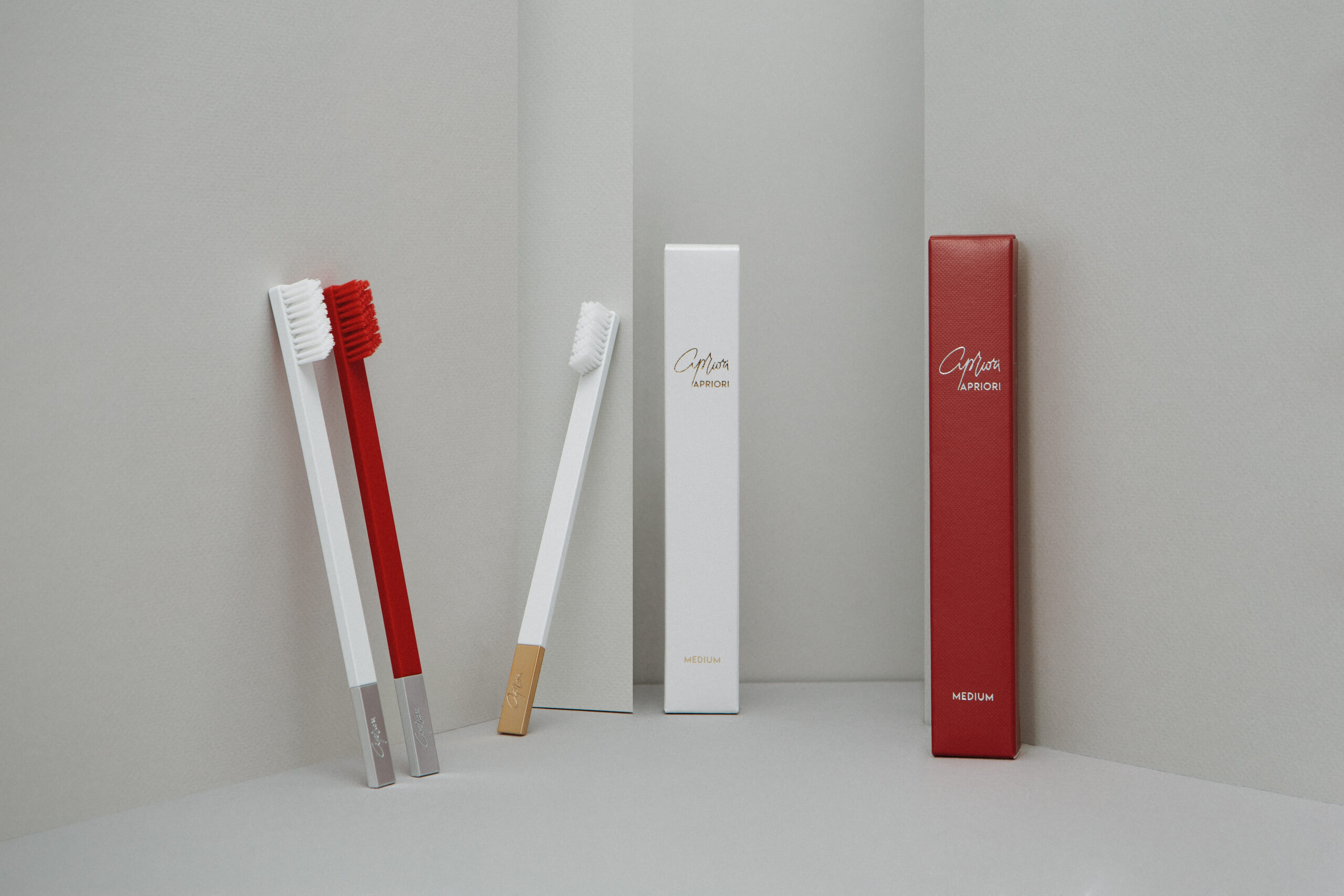Red and white designer toothbrushes SLIM by Apriori