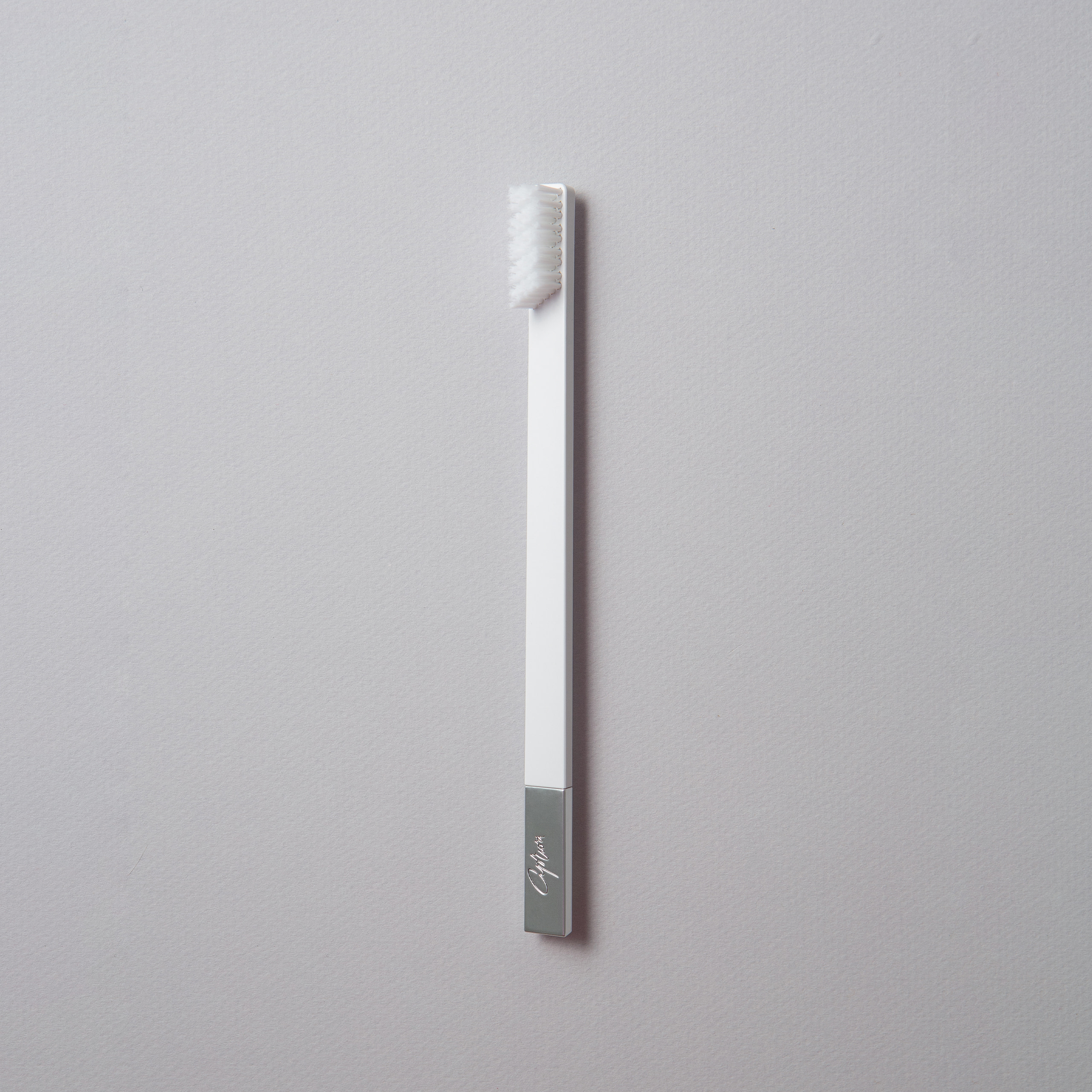 slim-by-apriori-white-silver-toothbrush-1