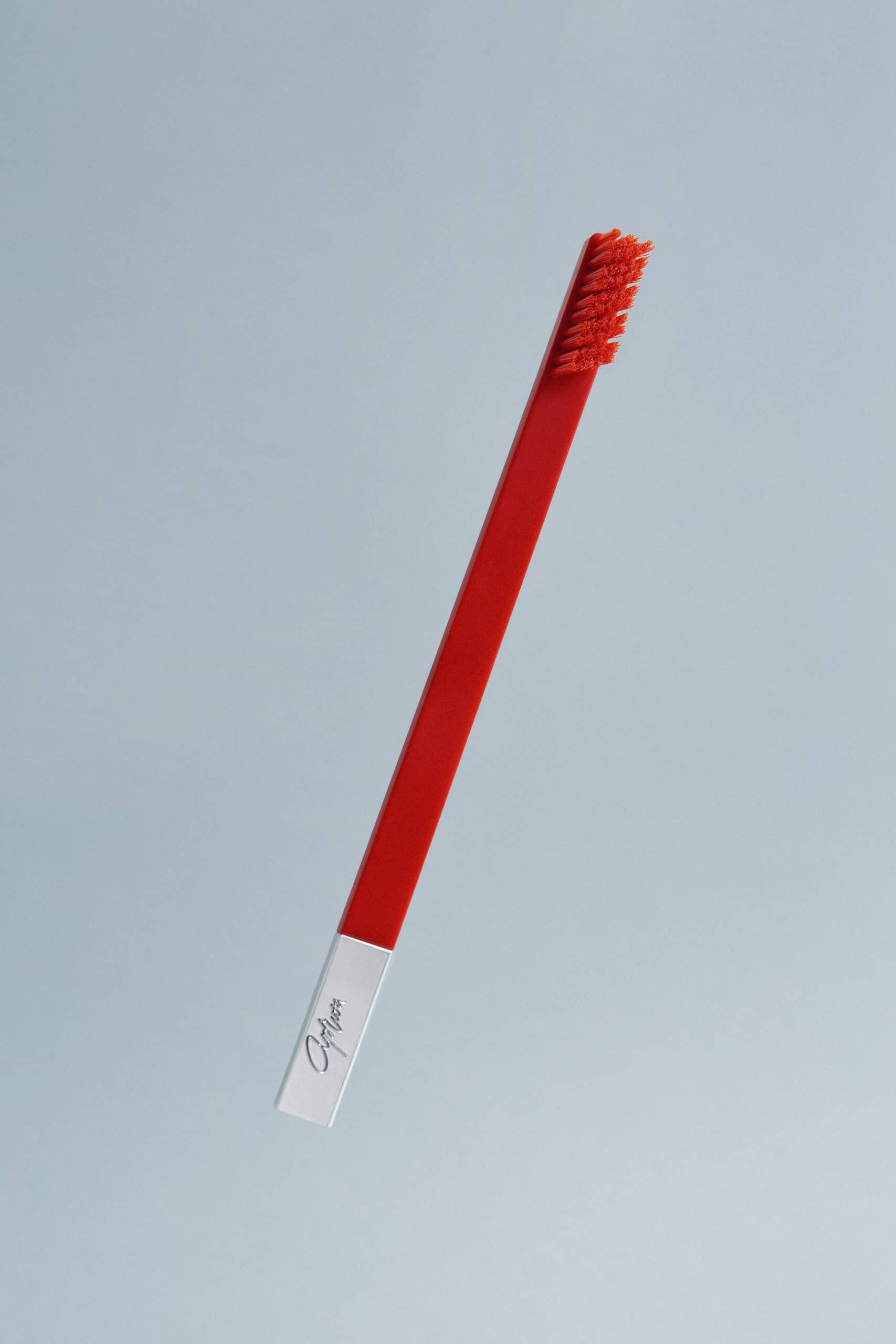 Slim by Apriori Carmine Red Silver designer toothbrush
