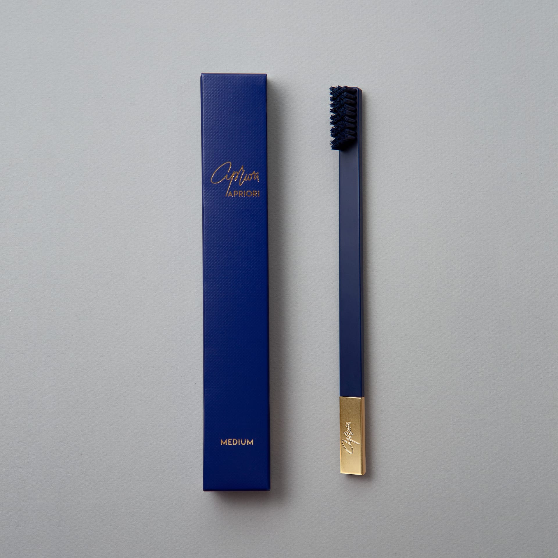 slim-by-apriori-sapphire-blue-gold-toothbrush-2023