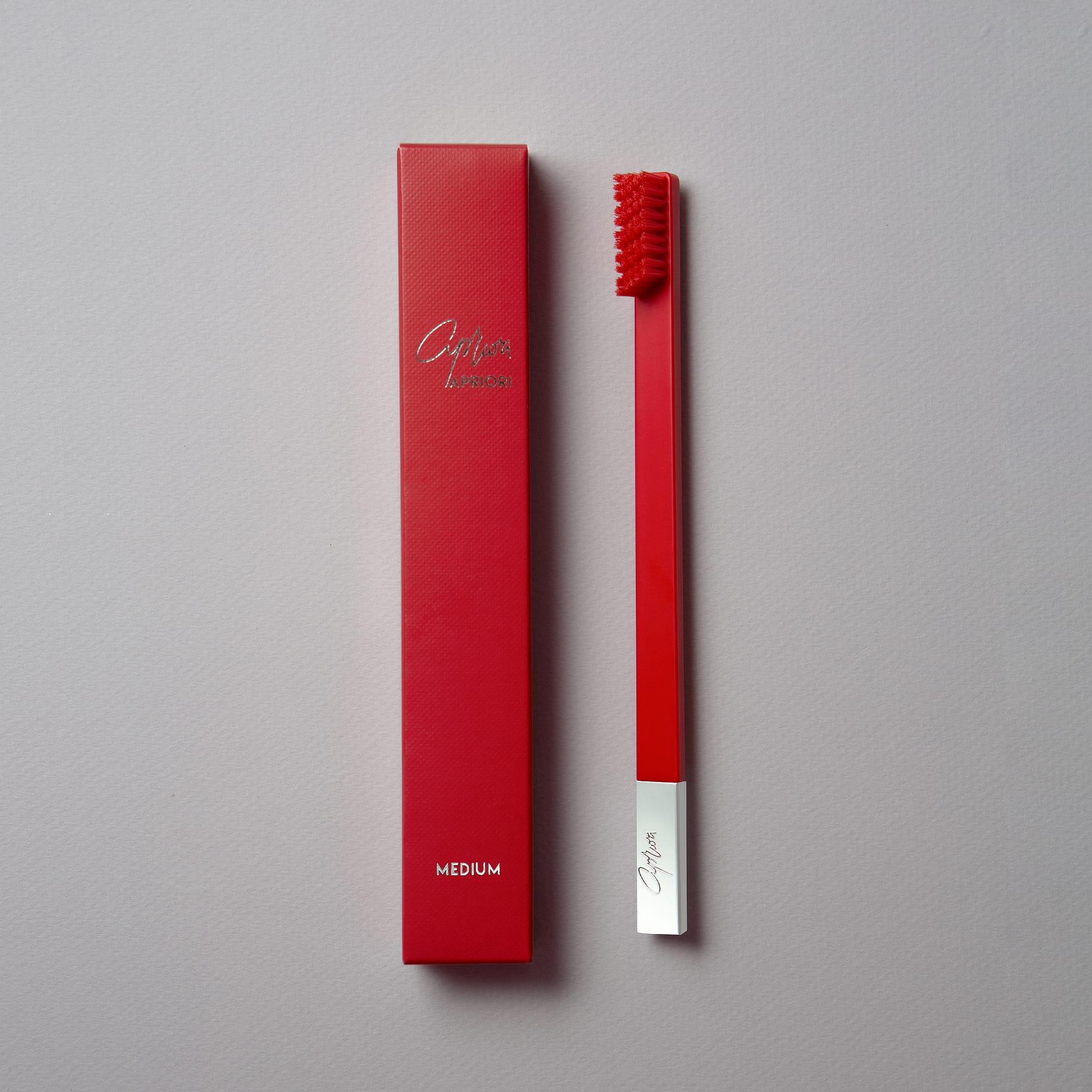 slim-by-apriori-carmine-red-silver-toothbrush-2023