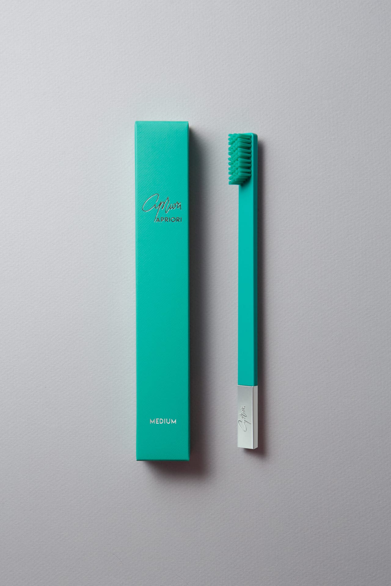 slim_turquoise_silver_toothbrush_1a